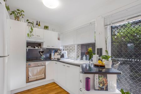 Neat and Tidy Townhouse in Great Location! - Photo 2