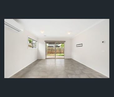 Tucked away from the street, a modern style three bedroom home - Photo 1