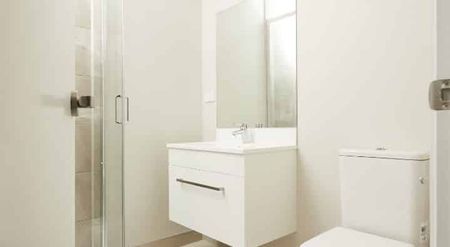 Modern One-Bedroom Townhouse in Prime Location - Photo 2