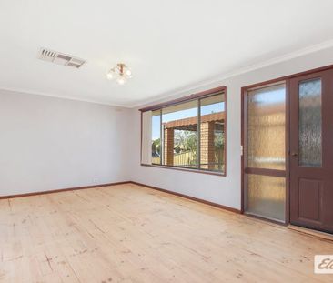 Three Bedroom Home with Large Yard - Photo 2