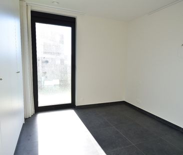 Luxueus gelijkvloers appartement met tuin, garage en 2 slaapkamers ... - Foto 5