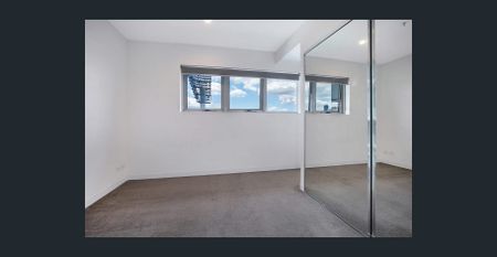 Stylish 3-Bedroom Apartment with Resort-Style Amenities in the Heart of Woolloongabba - Photo 3