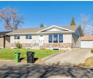 Newly Renovated Home with Separate Suites – Walkable and Bike-Friendly - Photo 1