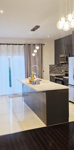 LIBRE Condo semi-meublé sur 2 étages proche de tout à louer Longueuil Saint-Hubert - appartement / logement - Photo 1