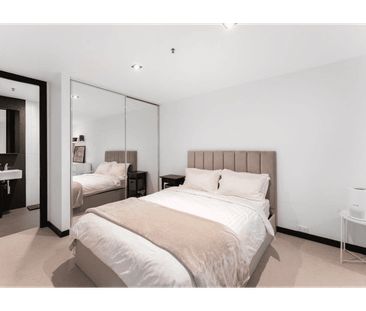 Light, Bright, and Perfectly Positioned – Your Urban Sanctuary Awaits - Photo 1