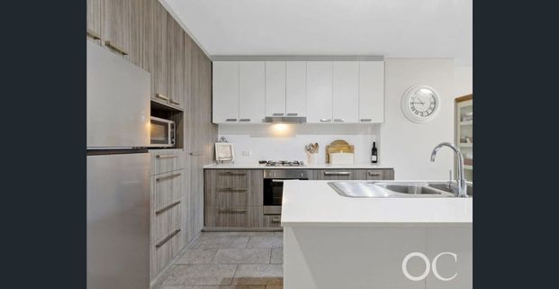 Open the Door to Effortless Living in the Heart of Mawson Lakes - Photo 1