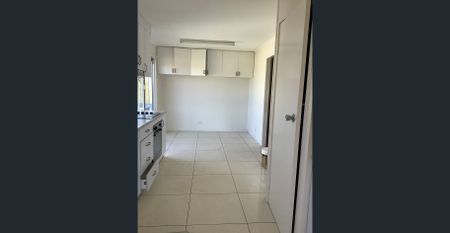 Spacious 4-Bedroom Home with Dual Living & Huge Shed! - Photo 5