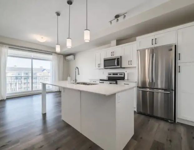 Auburn Bay - Top Floor Condo - 2 Bed, 2 Bath | 417 - 200 Auburn Meadows Common Southeast, Calgary - Photo 1