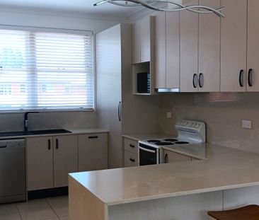 Stunning Renovated 2 Bedroom unit in quiet location - Photo 1