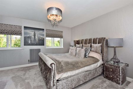 A beautifully finished town house newly available to the rental market with off-street parking and garage. - Photo 2