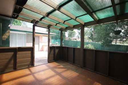 Neat and tidy Family Home- with a perfect yard - Photo 2