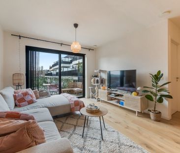 Nieuwbouwappartement met zonnig terras in hartje Steendorp - Photo 2