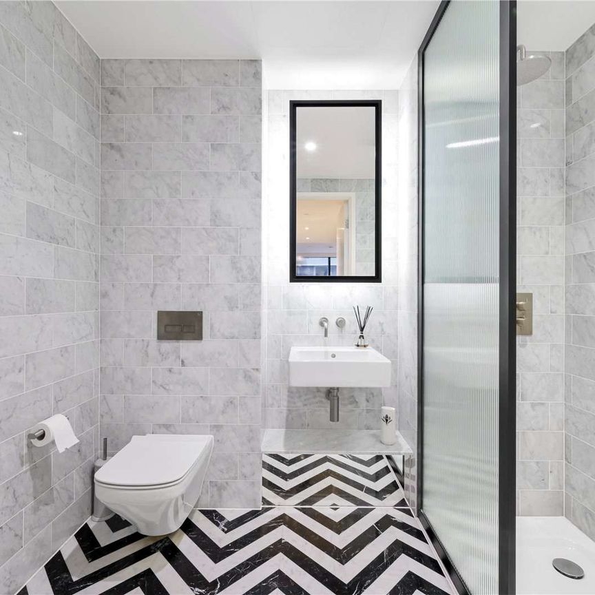 Large wrap around garden balcony, with dual aspect south westerly views from this stylish two bedroom apartment, located in Wardian's West Tower. - Photo 1