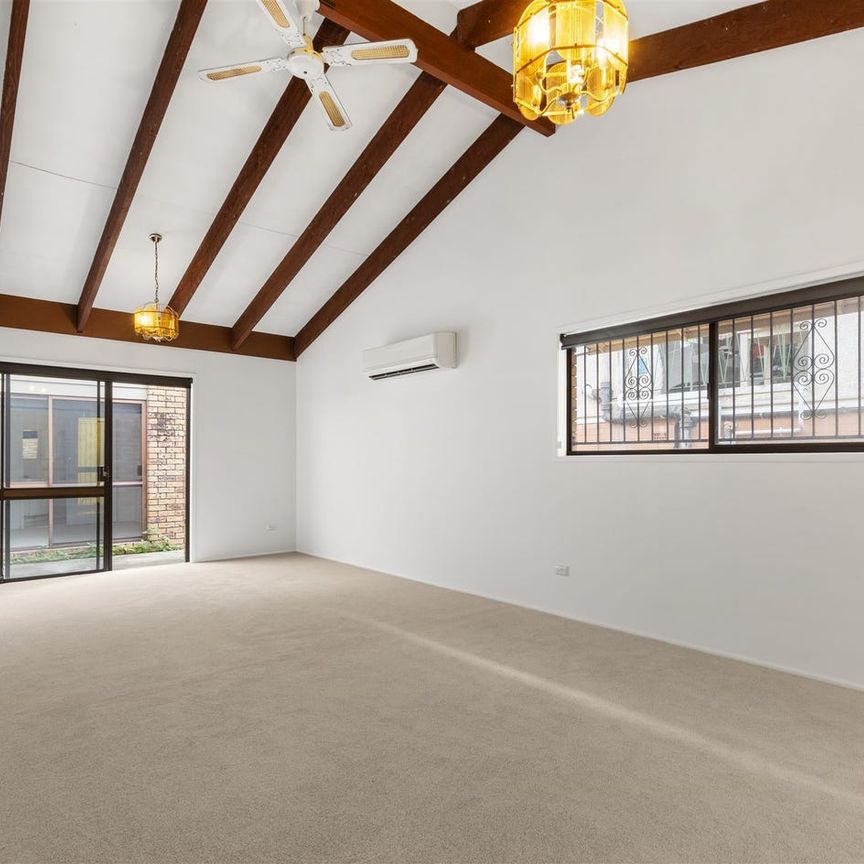 SUPERBLY LOCATED DUPLEX - Photo 1