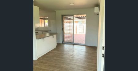 Refurbished Over 55's Unit with Courtyard - Photo 5