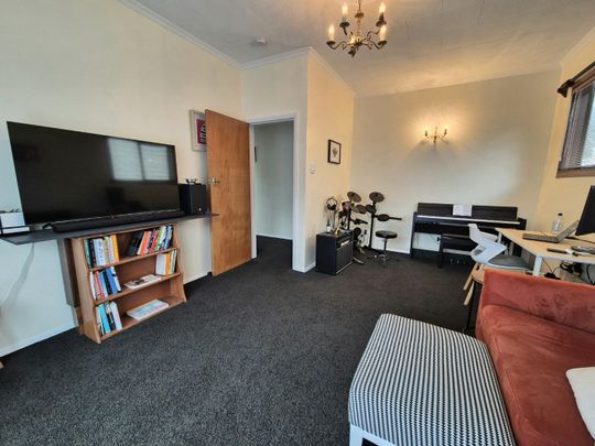 Charming 2-Bedroom Home in the Heart of Island Bay - Photo 1
