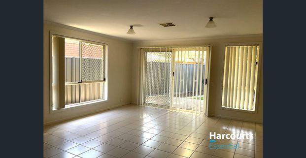 Spacious Family Home with Dual Living Areas and Double Garage - Photo 1