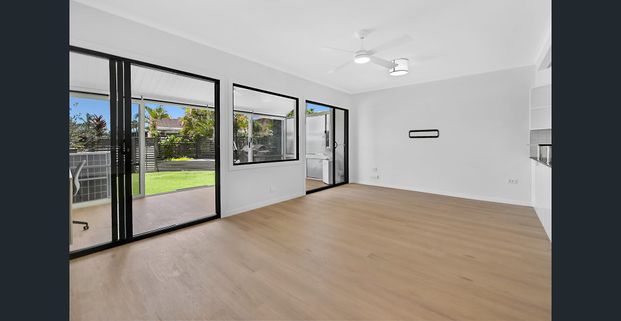 Skyline Views, Solar Savings & Three Brand-New Bathrooms — Your Bundall Haven Awaits - Photo 1