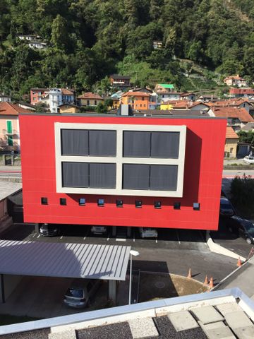 Appartamento moderno di 3.5 locali con balcone e vista panoramica a Solduno - Photo 4