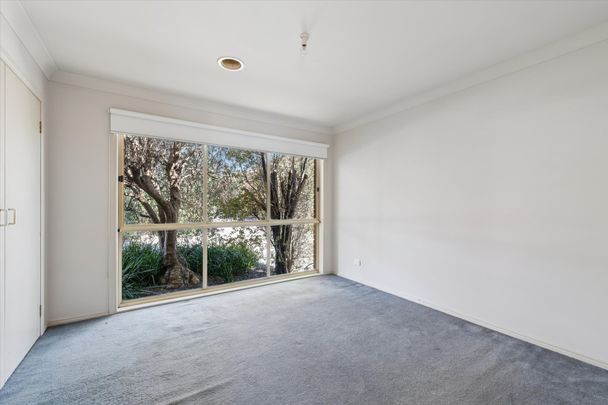 Neat Single-Level Unit with Private Backyard - Photo 1