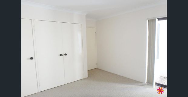 YOUR PERFECT VICTORIA PARK PAD WITH COURTYARD AND CONVENIENCE - Photo 1