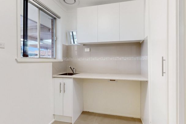 Spacious Family Home with Modern Features and Prime Location - Photo 1