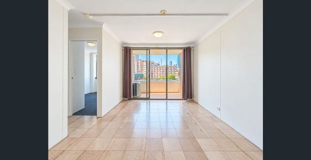 Aircon in both bedrooms and tiled floor throughout the living!!! - Photo 1