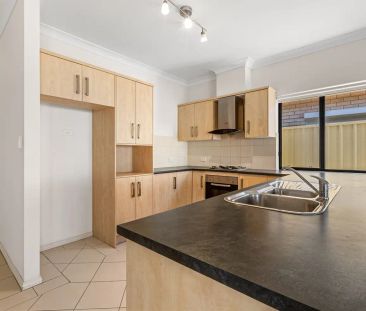 “Modern Family Home with Versatile Layout and Spacious Backyard” - Photo 2