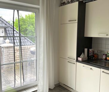 Wohnen in einer gemütlichen Dachgeschosswohnung in zentraler Lage d... - Photo 1