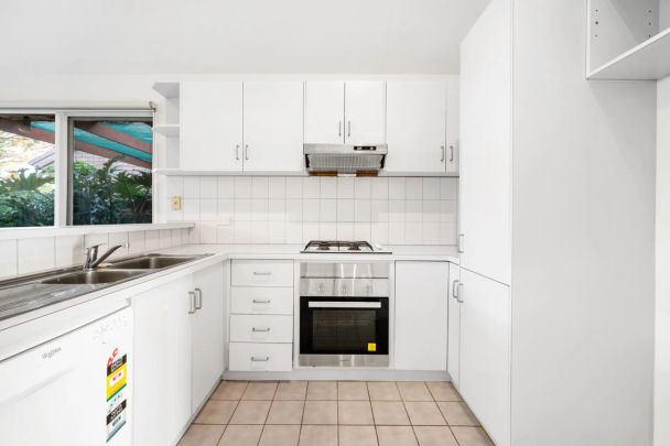 Large two bedroom, two living area townhouse offers rare opportunity - Photo 1