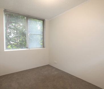 Bright & central! This elevated first floor unit is not one to miss! - Photo 6