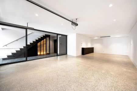 AS NEW LUXURY COASTAL HOME WITH LIFT SERVICING EACH FLOOR - Photo 2