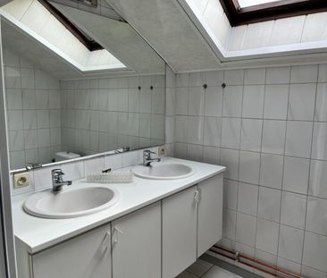 Ruim appartement met 2 slaapkamers en autostaanplaats te Leke - Photo 6