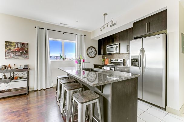 Downtown Condo | 2 Bed, 2 Bath | Heat & Water Included - Photo 1