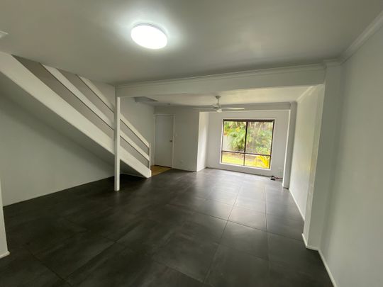 Renovated Townhouse In Convenient Location! - Photo 1