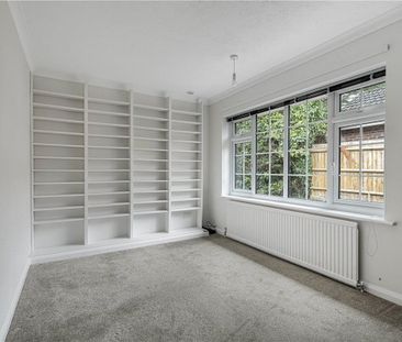 A 3 bedroom detached bungalow with a double garage and ample parking. - Photo 2