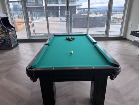 Luxury 3 Bed + Den Condo at Water Street by the Park - Photo 4