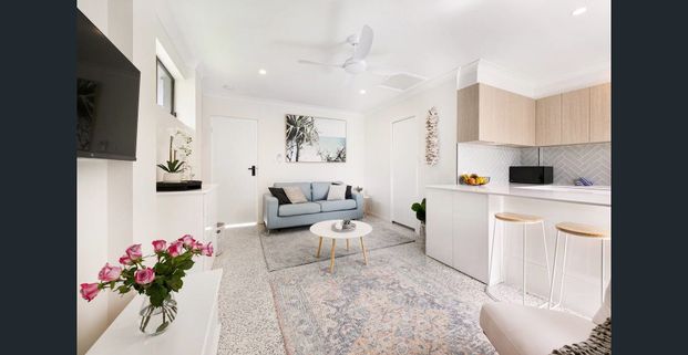 Kick back and relax in this calm, stylish space - Photo 1