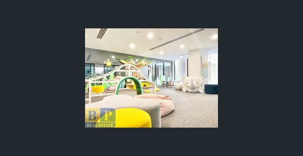 Sky and Tree Top View Apartment on Level 13 - Photo 1