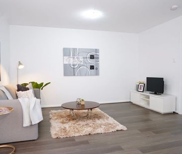 Easy-Care Living with Comfort & Convenience - Photo 1