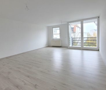 Helle Wohnung mit großem Wohnzimmer und Westbalkon - Foto 4