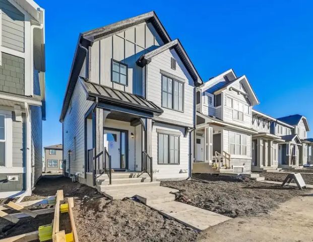 Brand new 3 bedroom home with a den and bonus room | 30 Magnolia Street Southeast, Calgary - Photo 1