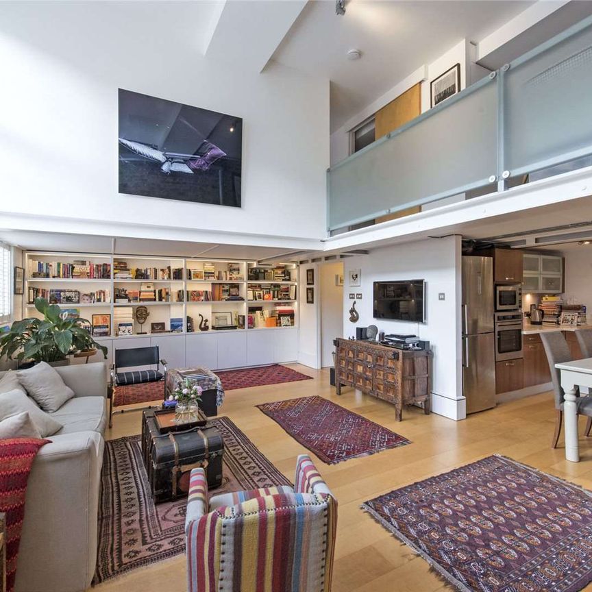A beautifully designed two bedroom loft style apartment set within this stylish converted Victorian school. - Photo 1