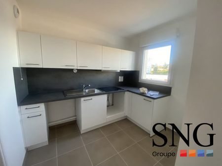 T4 AVEC LOGGIA + PARKINGS - Photo 4