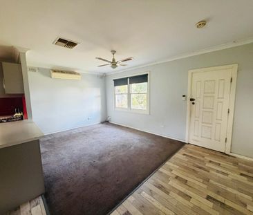Spacious Three-Bedroom Home with Outdoor Entertaining Area - Photo 1