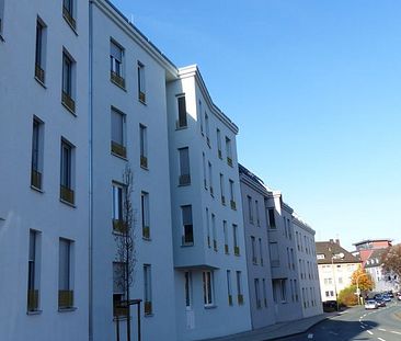 EG links - Wohnung Nr. 27 mit großzügiger Terrasse im exklusiven Neubau im Stadtzentrum - Photo 2