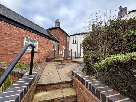 A 2 bedroom terraced cottage with a double garage and off-street parking in Willesley. - Photo 2