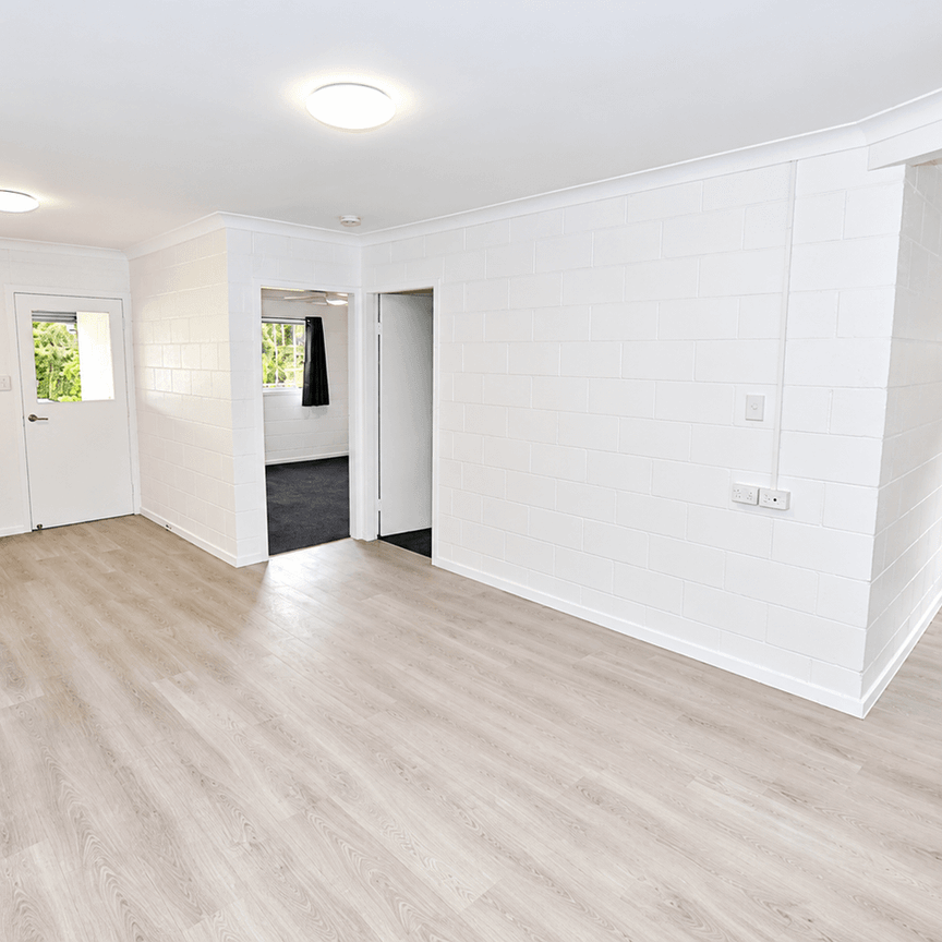 Spacious Townhouse with Modern Comforts - Photo 1