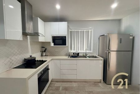 Spacious & Modern Three-Bedroom Granny Flat with Driveway Access - Photo 4