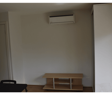 Secure 2-Bedroom Apartment with Cafes, Shops & Transport at Your Do... - Photo 6